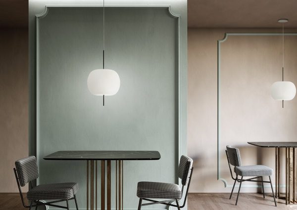 Suspension Kushi de chez Kundalini installée dans un intérieur contemporain, lumière diffuse et design sculptural. Titre